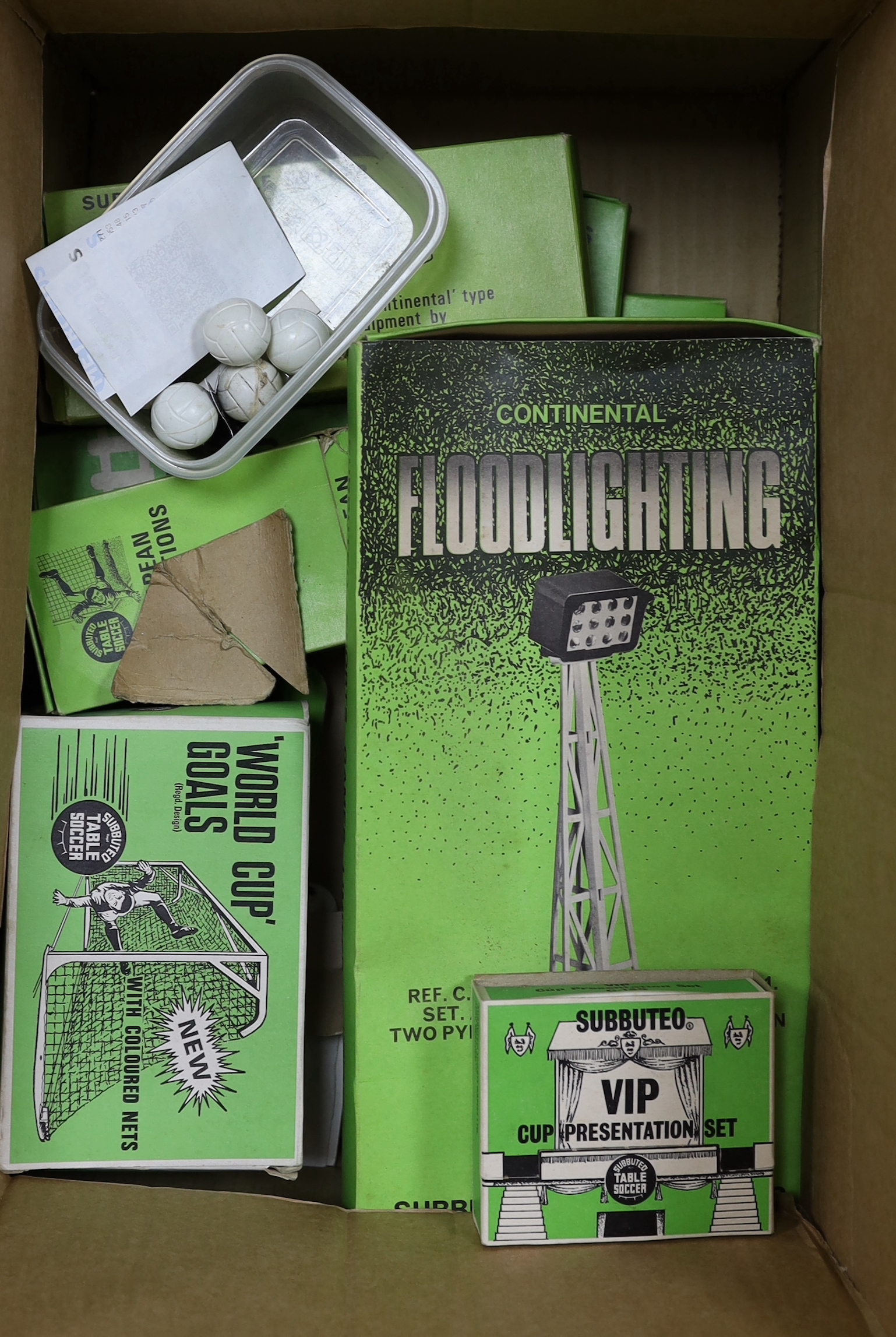 A collection of boxed Subbuteo accessories including; a Club Edition set, World Cup goals (C.130), European Competitions Cup (C.118), Floodlighting (Set A), VIP Cup Presentation set (C.135), Throw-in Figures (C.132), TV